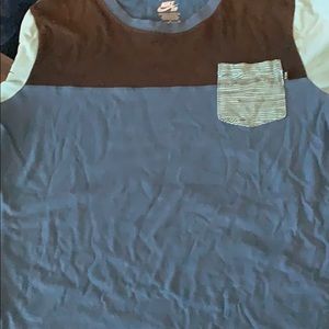 It’s a Nike Sb skateboarding boy shirt